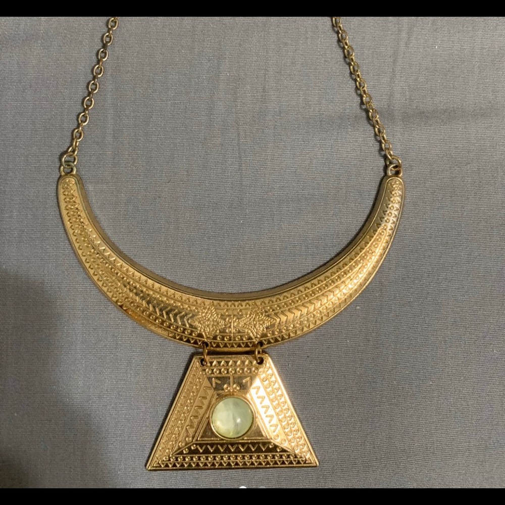 Gold necklace.